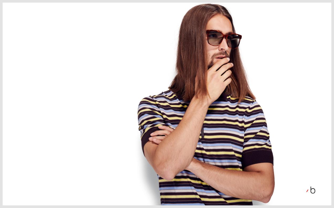 Male model with long hair wearing tortoiseshell gucci sunglasses for men