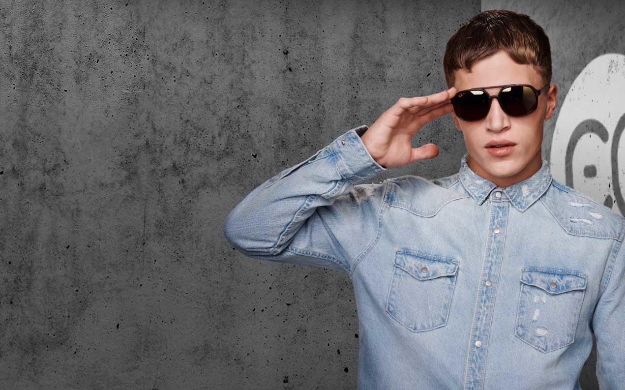 male model wearing Ray-Ban aviator sunglasses