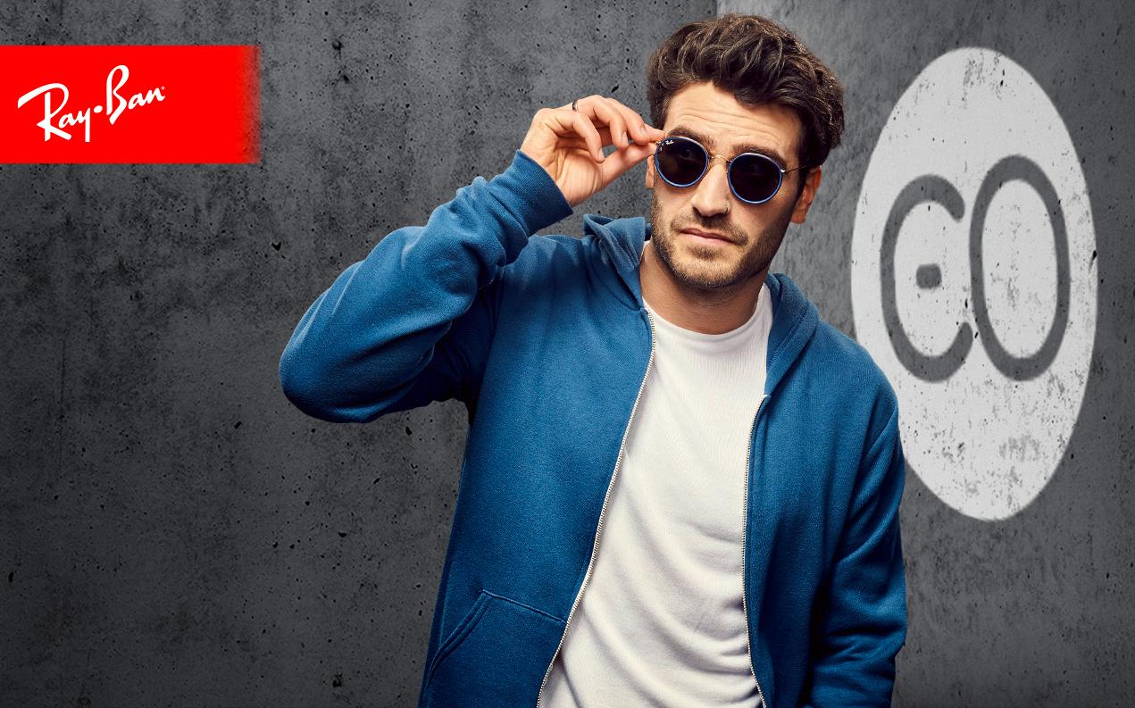 Male model wearing Ray-Ban sunglasses for men