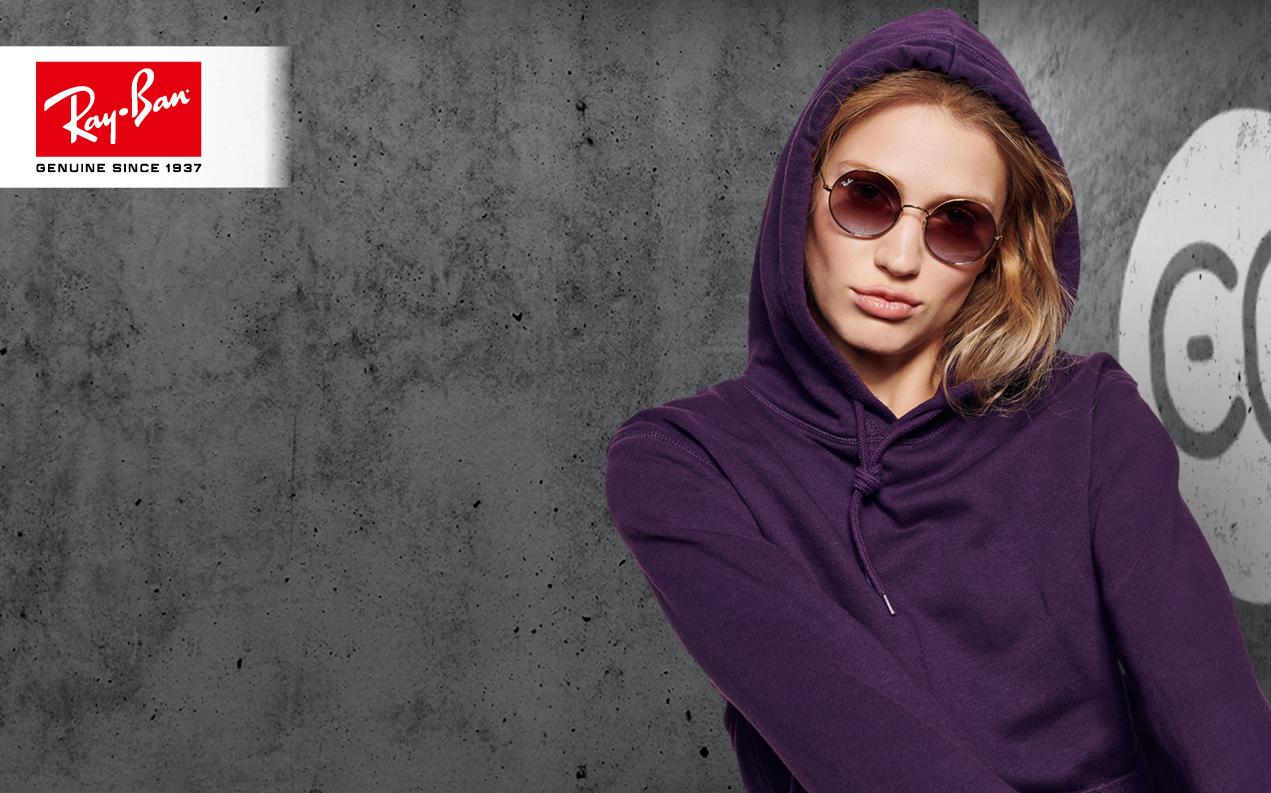 Female model wearing Ray-Ban sunglasses for women