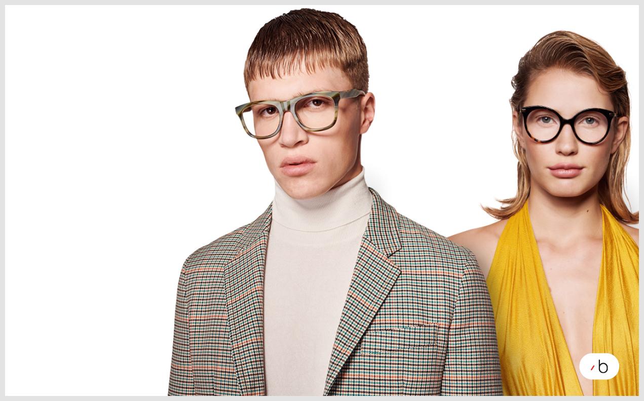 Manlig och kvinnlig modell bär glasögon från Gucci
