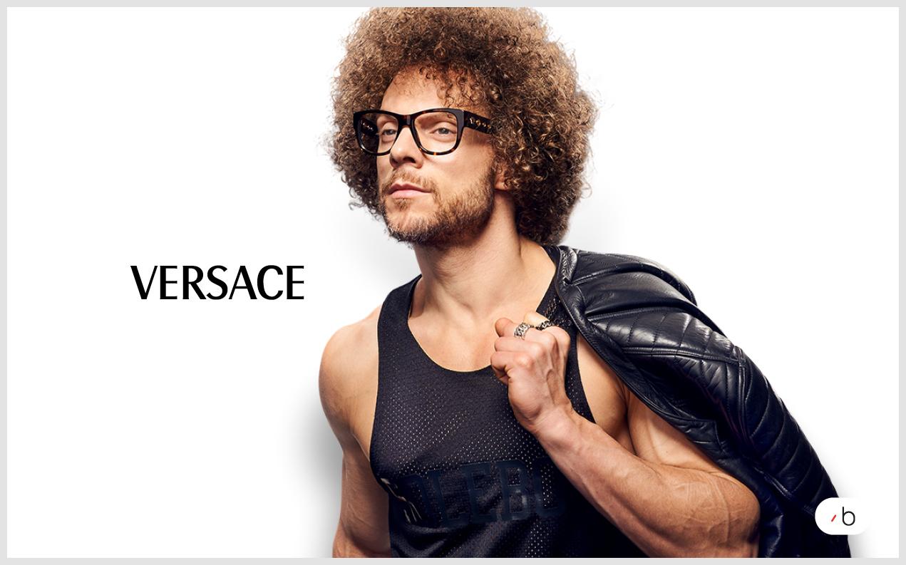 Male model wearing Versace glasses