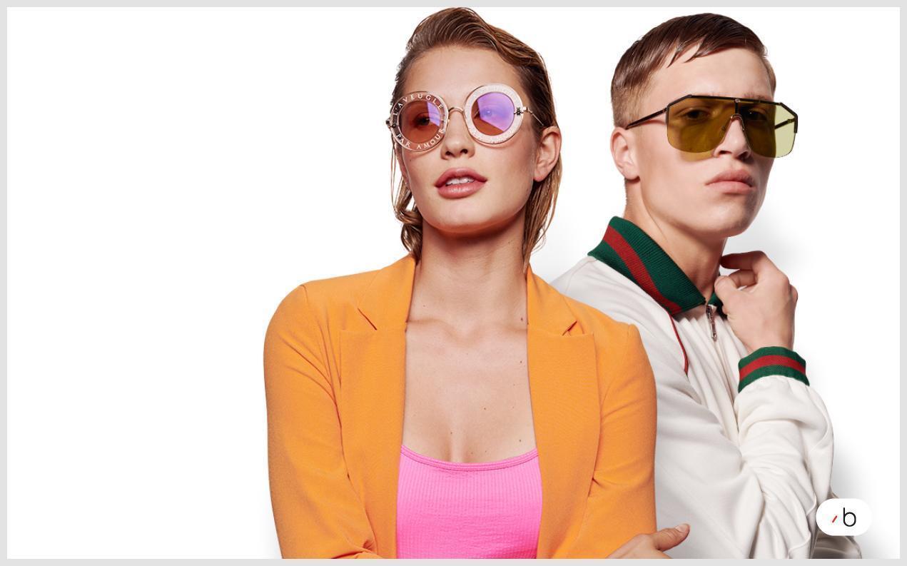 Manlig och kvinnlig modell bär designer-solglasögon från Gucci
