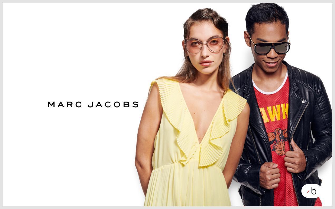 Manlig och kvinnlig modell bär designer-solglasögon från Marc Jacobs